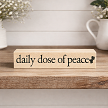 Funny bathroom sign that reads Daily Dose of Peace with a toilet graphic 