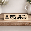 Funny sign that reads Fetch Me My Bathing Toaster with toaster and bathtub graphics 