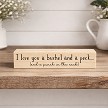 Funny relationship sign that reads I Love You a Bushel and a Peck and a Punch in the Neck 