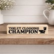 Funny bathroom sign with toilet graphic and Toilet Clogging Champion phrase 