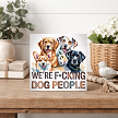 Funny Were Fcking Dog People sign featuring a colorful illustrated group of four happy dogs for dog lovers and pet parents 