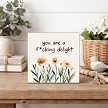 You Are a Fucking Delight funny sign with peach watercolor flowers and green botanical leaves on a neutral background 
