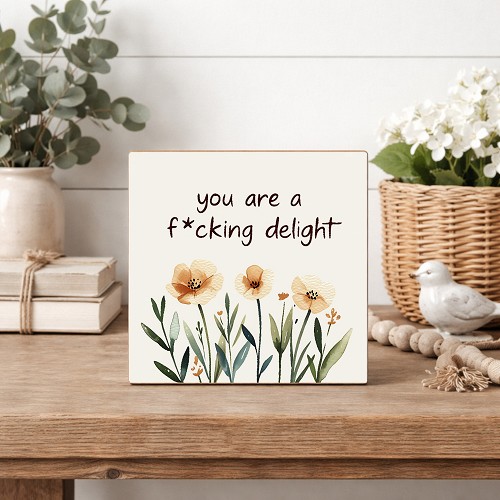 You Are a Fucking Delight funny sign with peach watercolor flowers and green botanical leaves on a neutral background 