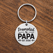 Personalized Promoted to Papa keychain with custom established year baby footprints and optional personalized back 