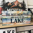 The Best Memories Are Made at the Lake sign with peaceful blue and green watercolor lake landscape design 