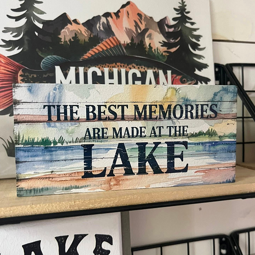 The Best Memories Are Made at the Lake sign with peaceful blue and green watercolor lake landscape design 