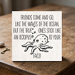Funny octopus friendship sign reading friends come and go like waves but true ones stick like an octopus to your face 