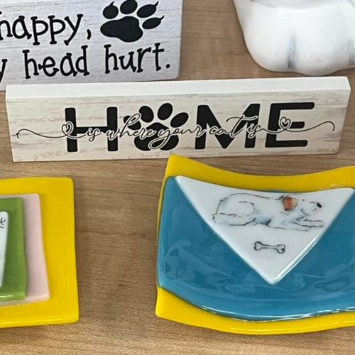 Home Is Where Your Cat Is sign with paw print design for cat moms, cat dads, cat lovers and pet families 